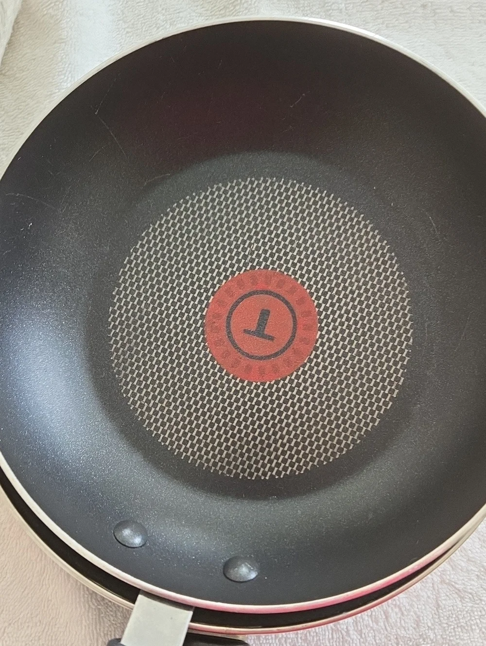 Two T-fal 10.5 And 8